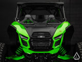 Green off-road vehicle with a black interior on a dark background