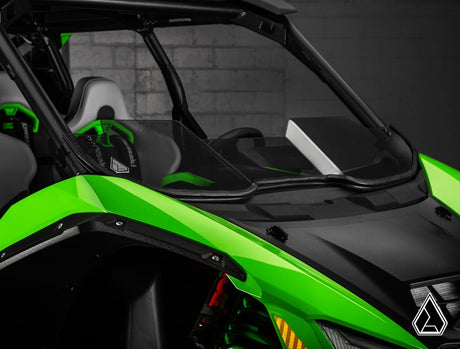 Assault Industries Half Windshield installed on Kawasaki Teryx H2 – durable polycarbonate design with aggressive styling